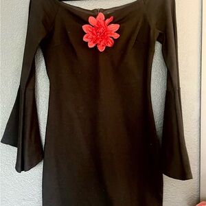 Gorgeous stretch Black dress by LULUS. Size Medium bell sleeves